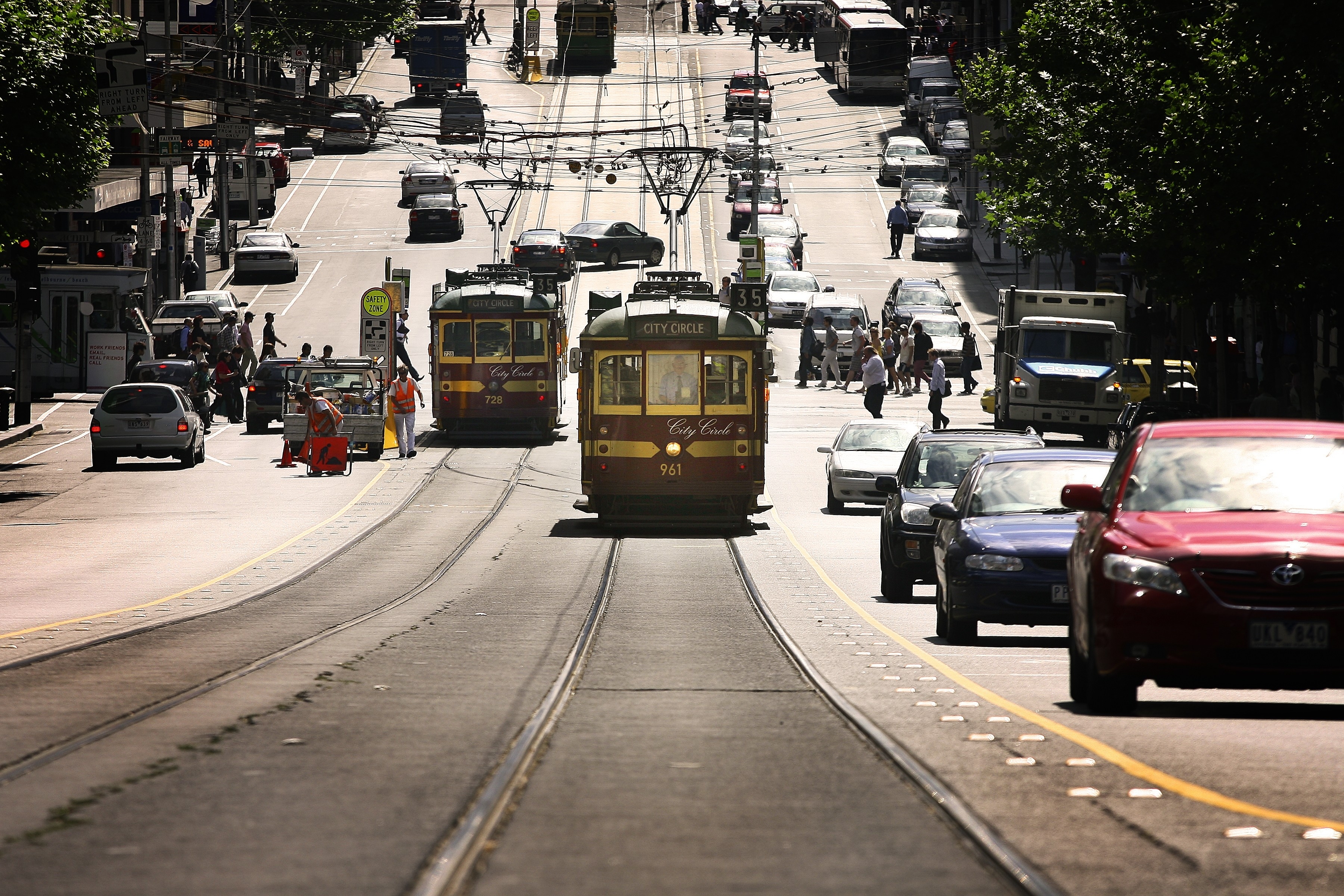 Keolis Melbourne tramways alongside cars