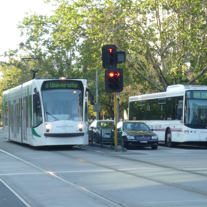 Trams and cars share the road in Melbourne.