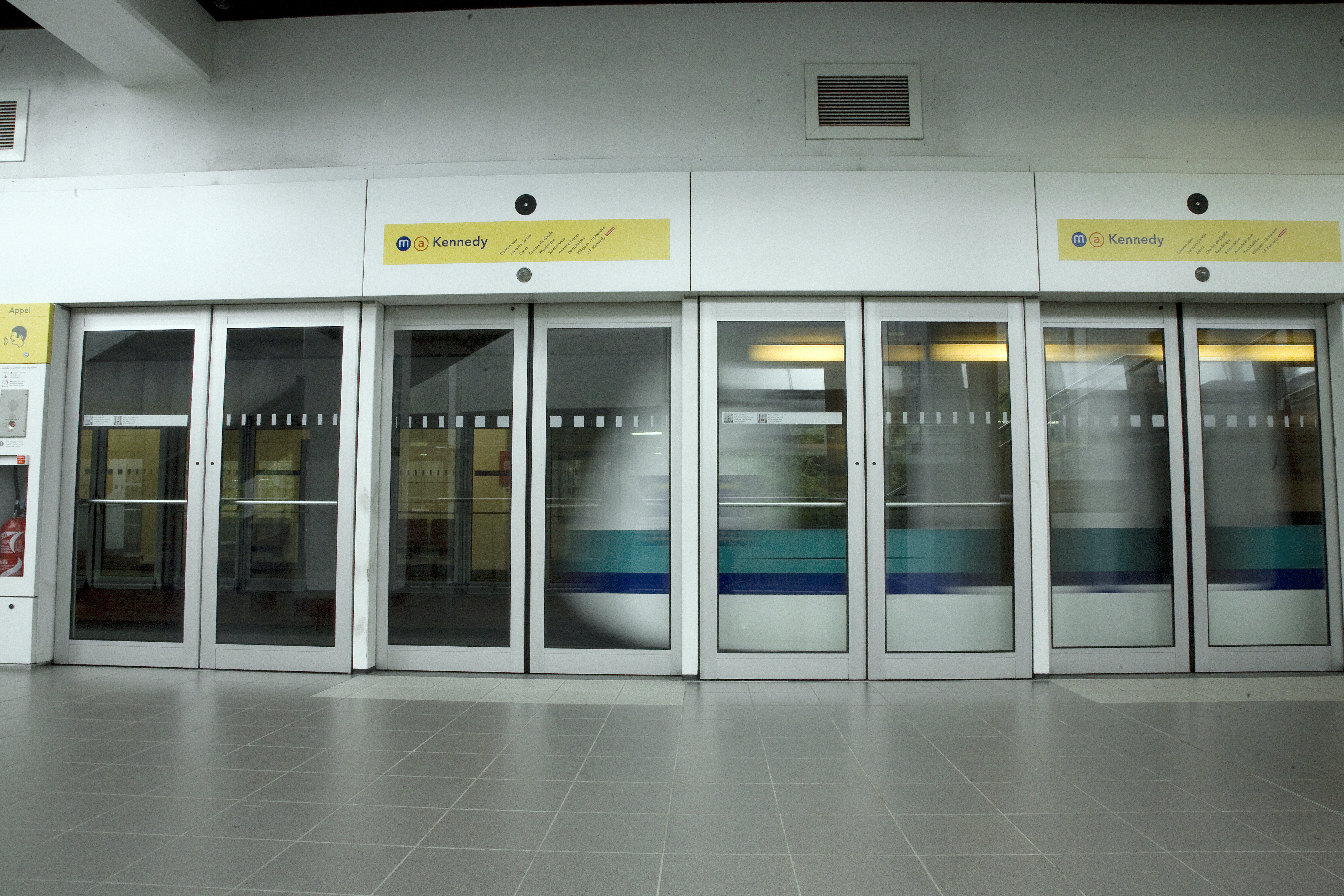 A train of the Rennes metro leaves the station.