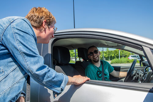 Discussion entre un conducteur et un passager