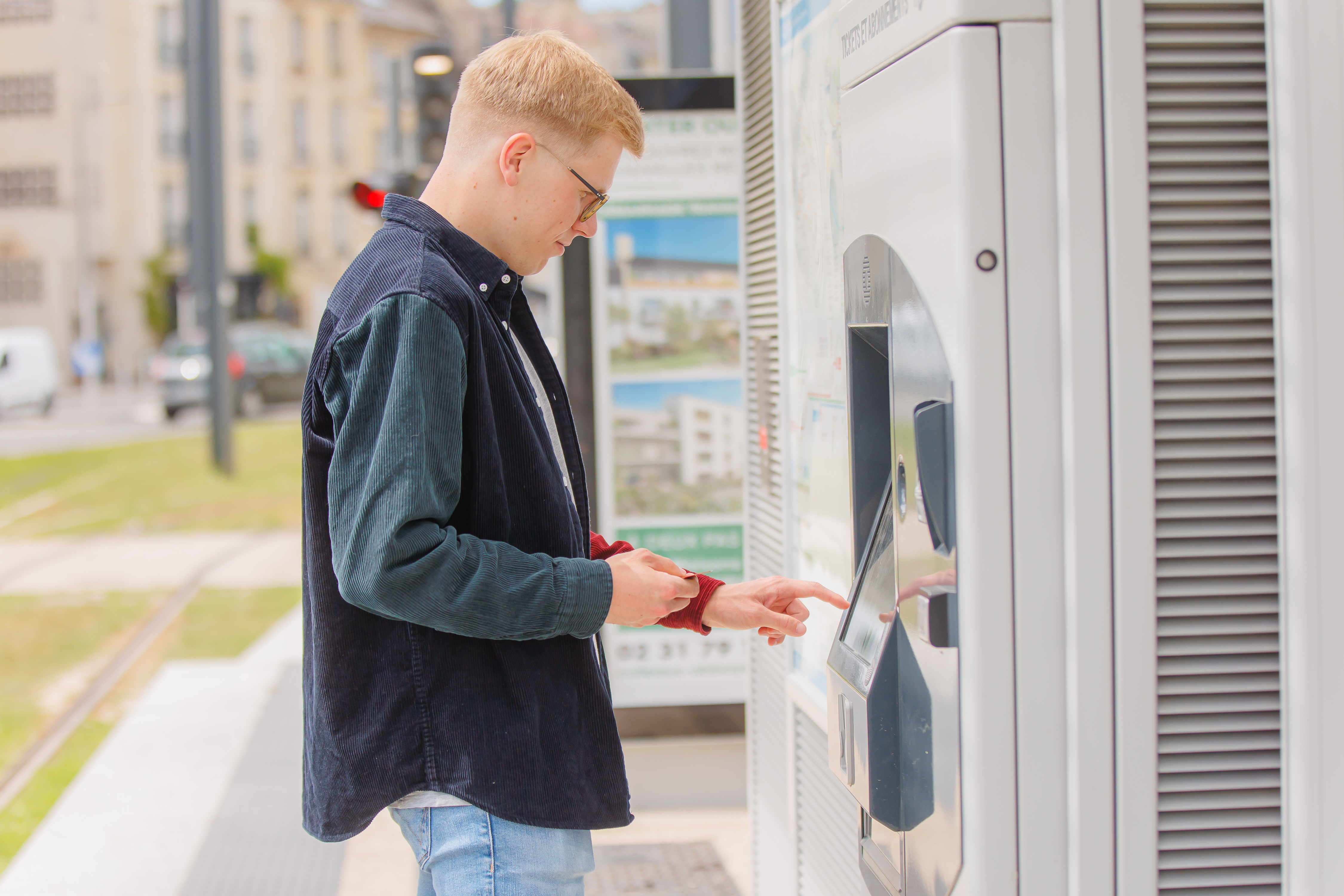 Selecting a transport ticket at a kiosk