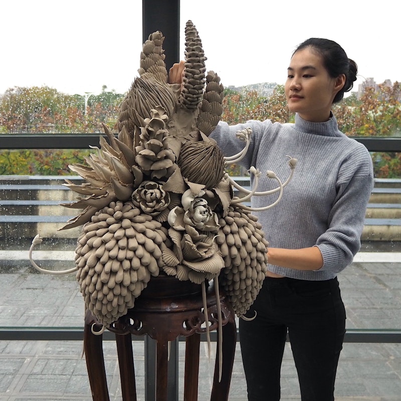 Ruth Ju-shih Li with her work during a public demonstration at Yingge Ceramics Museum. December 2019. Photo: Tzu Chun Fan