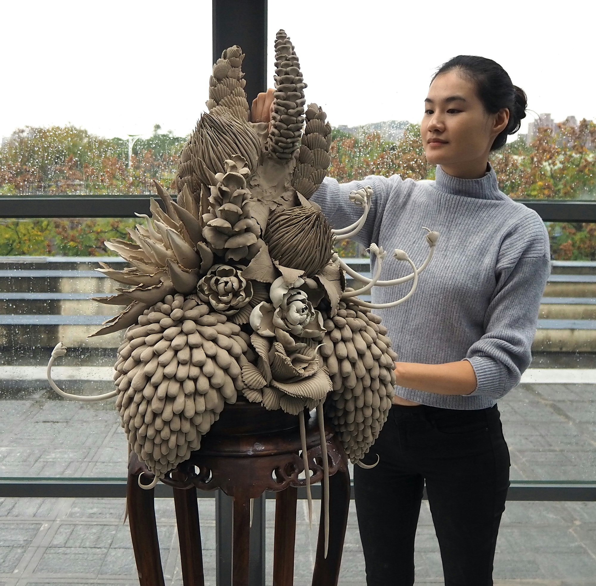 Ruth Ju-shih Li with her work during a public demonstration at Yingge Ceramics Museum. December 2019. Photo: Tzu Chun Fan