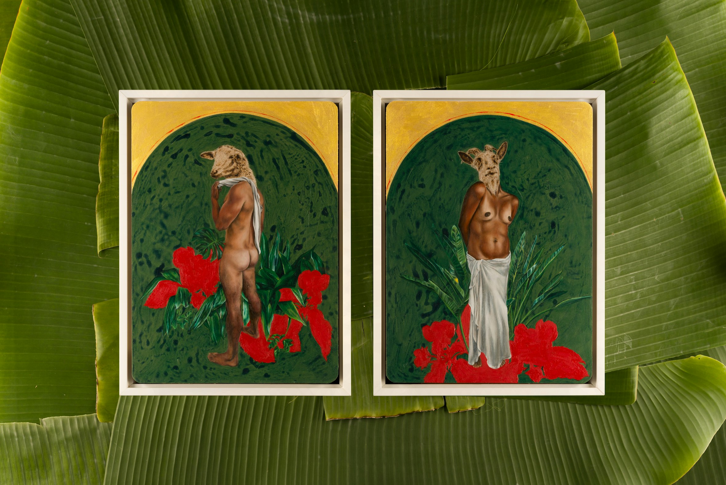 Two painted panels of two dark-skinned figures standing against a green backdrop, wearing animal masks resembling a sheep and a ewe. One of them looks over their shoulder while the other looks directly at us.