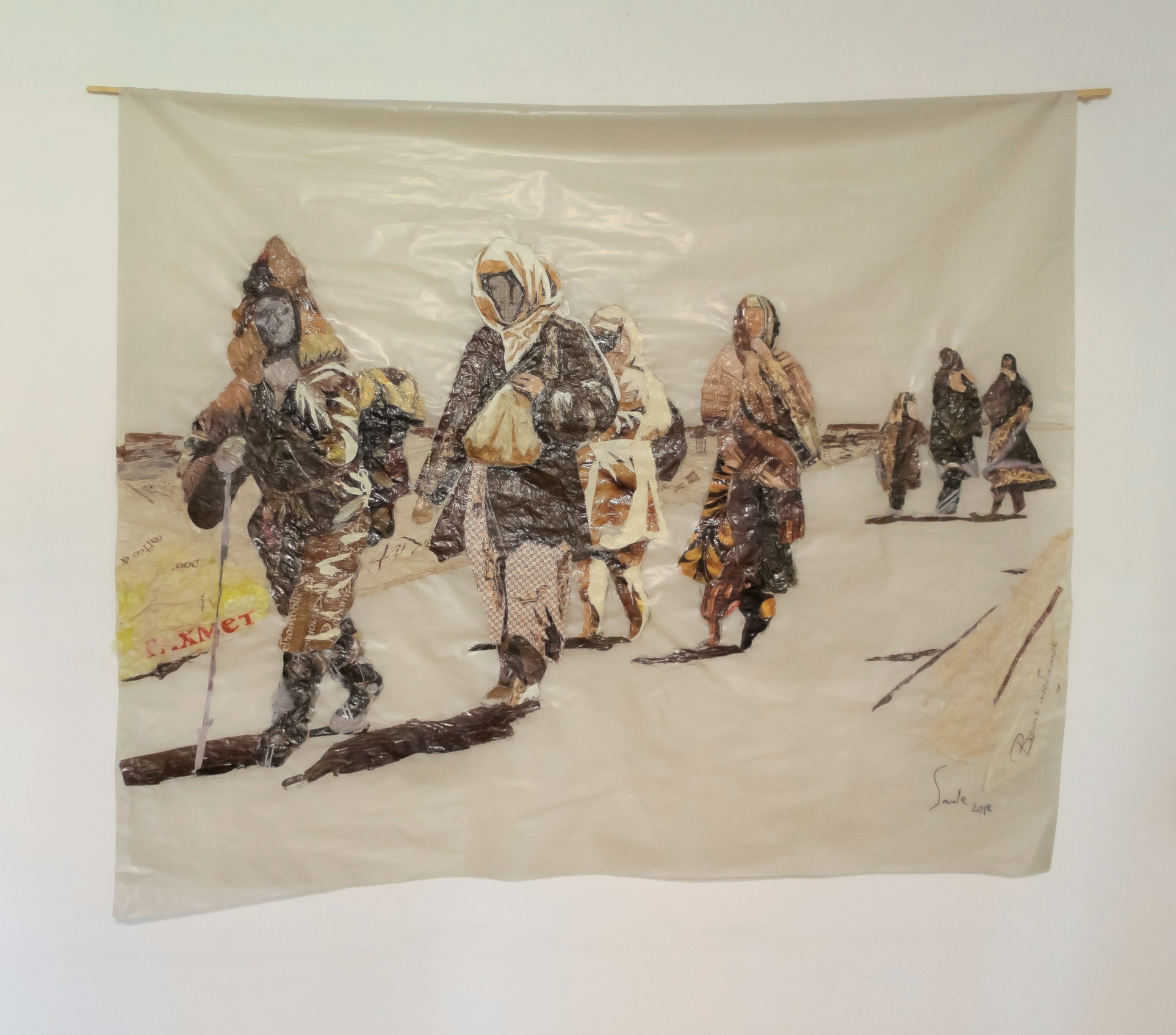 An artwork depicting figures walking on a path.