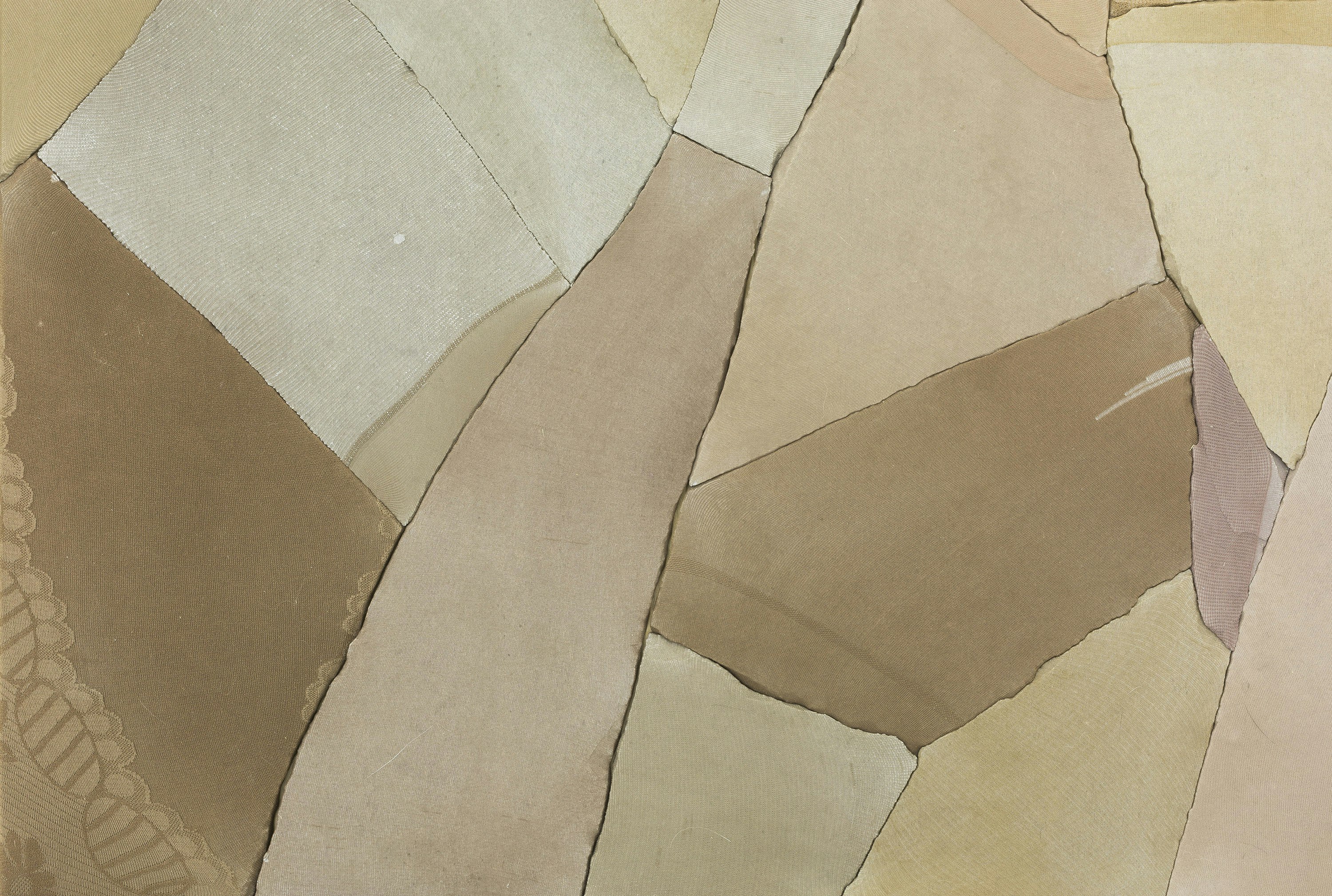 Beige abstract artwork made with cement, nylon, plywood, iron and resin.