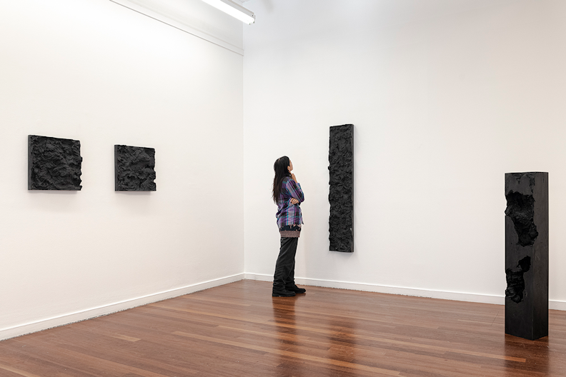 Holding Patterns Part One: Kien Situ (installation view) Left: Kien Situ, Shanshui (Wall Plate), 2020, Chinese Mò ink, gypsum plaster, 48 x 48 x 8cm. Centre: Kien Situ, Shanshui (Scroll), 2020, Chinese Mò ink, gypsum plaster, 88 x 64 x 8cm. Right: Kien Situ, Shanshui (Column), 2020, Chinese Mò ink, gypsum plaster, 136 x 24 x 24cm. Courtesy the artist.