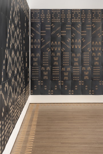 Vaimaila Urale, Manamea ma Anivanuanua, 2020, black card and sand, 240 pieces across two walls, each wall installation measuring 5940x2520mm. Photo: Kai Wasikowski for 4A Centre for Contemporary Asian Art. Courtesy the artist.