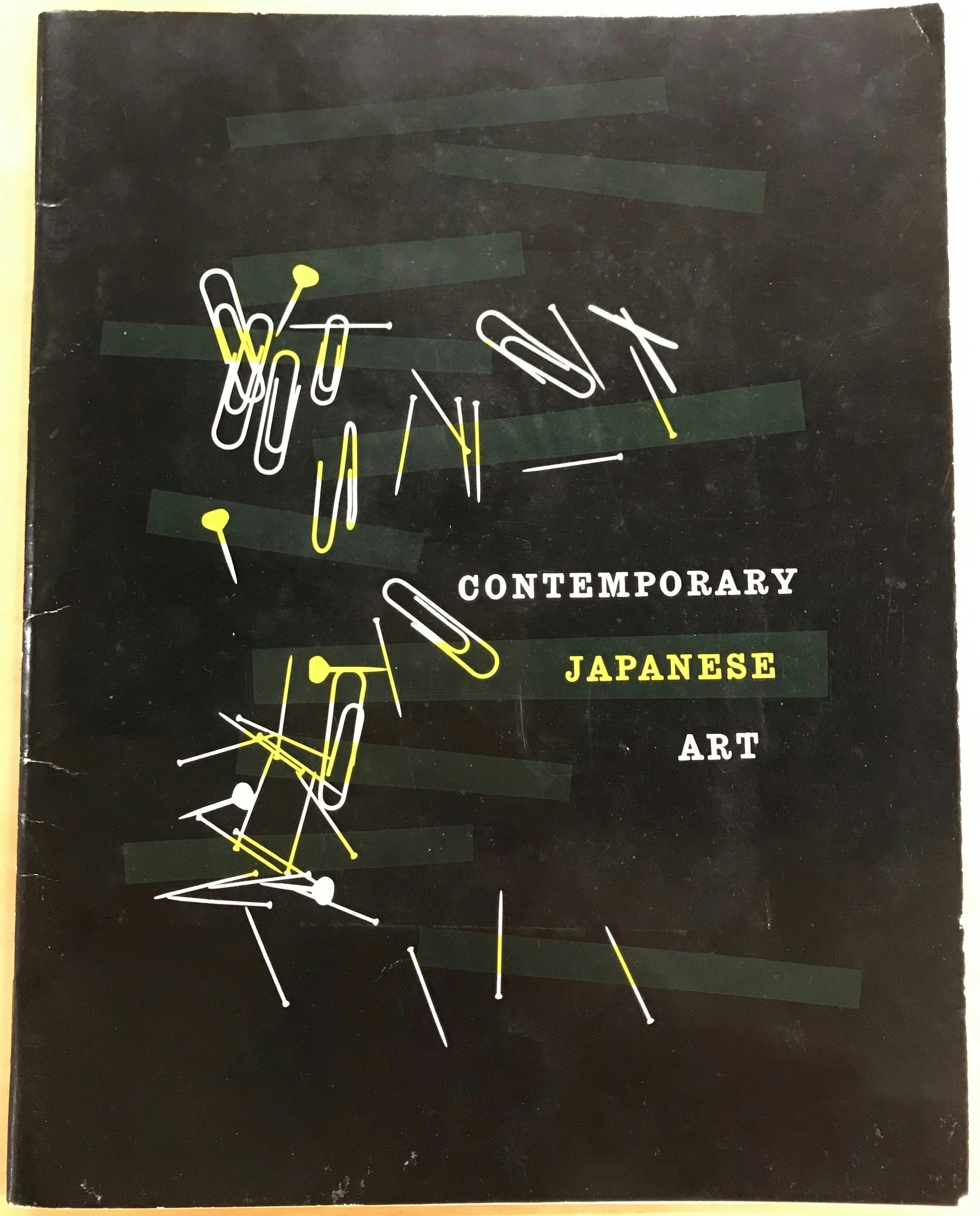 Front cover of a book titled 'Contemporary Japanese Art'. Title is surrounded by a spread of push pins, paper clips and dark green rectangles.