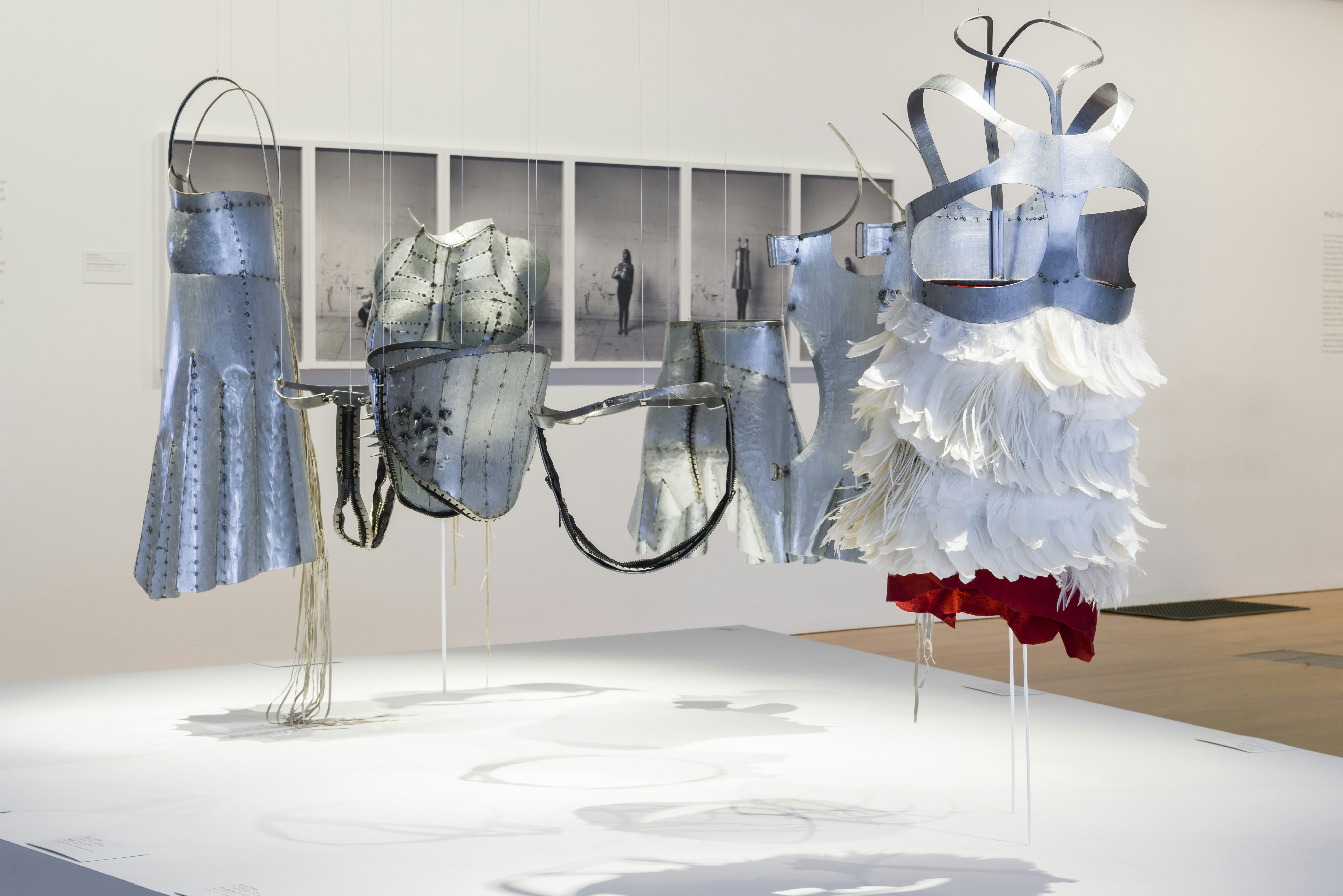 A series of blue-toned garments and armour fashioned from leather, galvanised steel and fabrics.