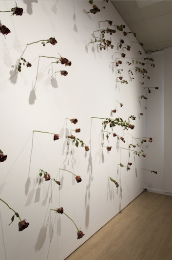 Audrey Newton, A Rosebud Bloomed with Each Step That I Took, 2022, roses, epoxy resin and latex, dimensions variable. Courtesy the artist.  Image credit: Garry Trinh