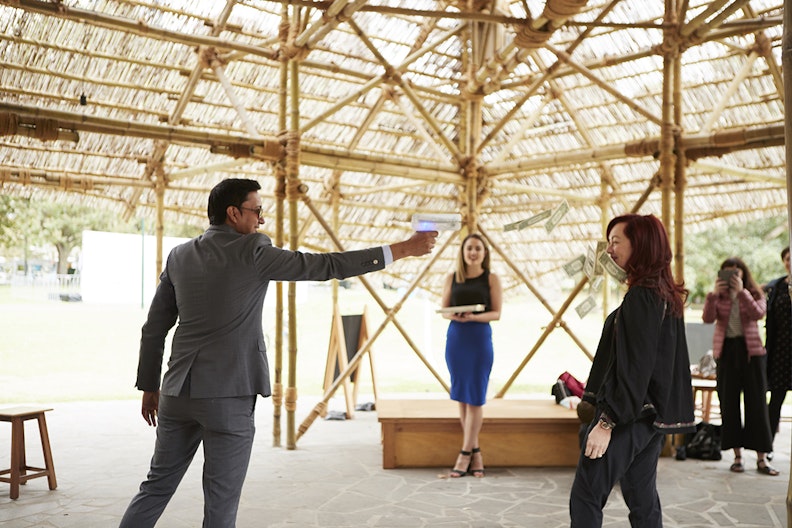 Abdullah M.I. Syed, Flying Buck Exchange (performance documentation), presented at MPavilion as part of the inaugural Asia TOPA.