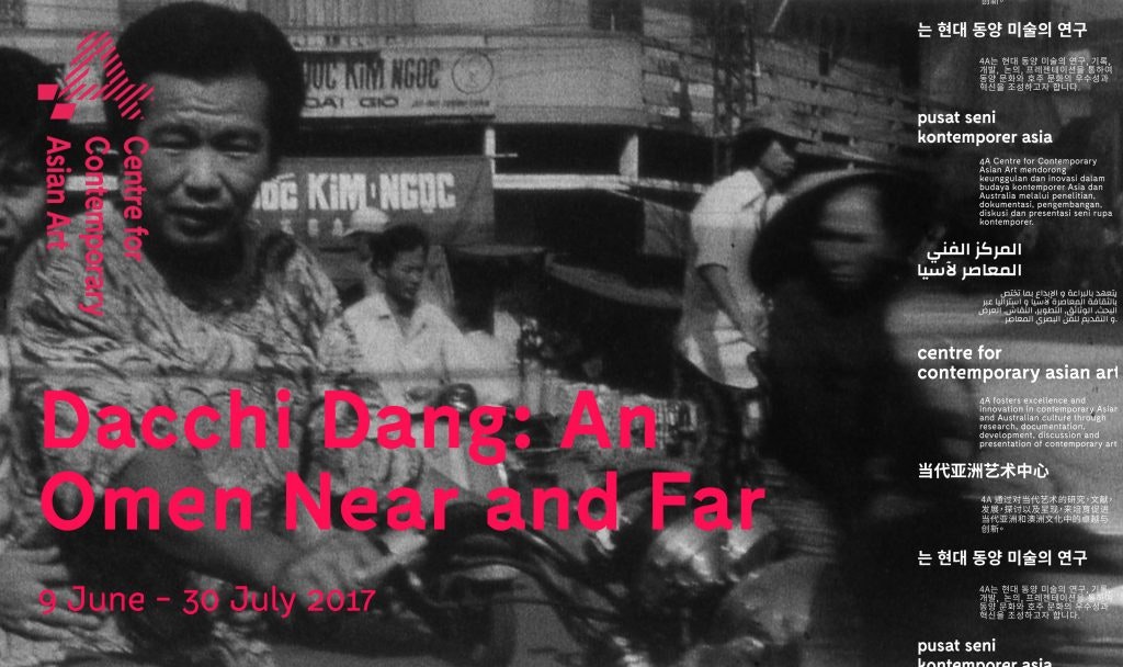 A black and white photo of a street scene in Vietnam for Dacchi Dang's exhibition An Omen Near and Far