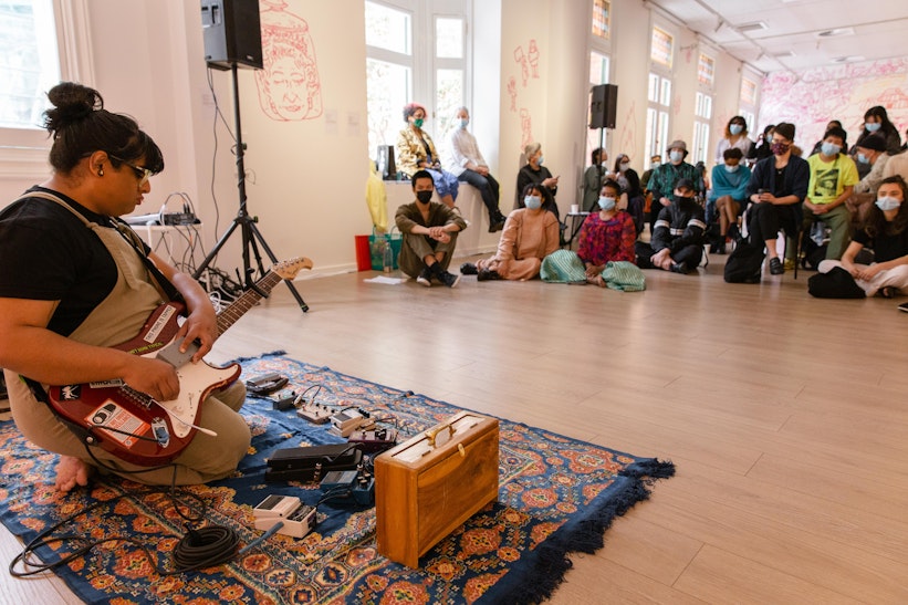 A performance by Shoeb Ahmed, TextaQueen: Bollywouldn't Opening Day, 2022, Installation view, 4A Centre for Contemporary Asian Art; photo: Anna Hay.