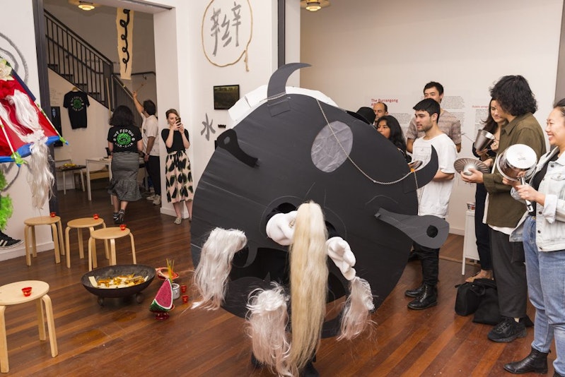 A photo inside 4A showing a group of people participating in the Hungry Ghost Festival: The Burrangong Affray event