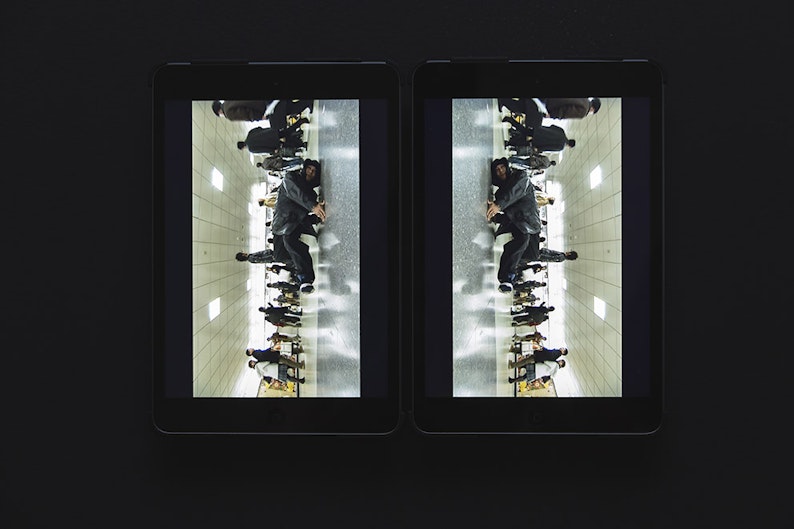 Shaun Gladwell, In a station of the metro (2006), two channel video on ipad minis installation view, 4A Centre for Contemporary Art. Courtesy the artist. Image: Document Photography