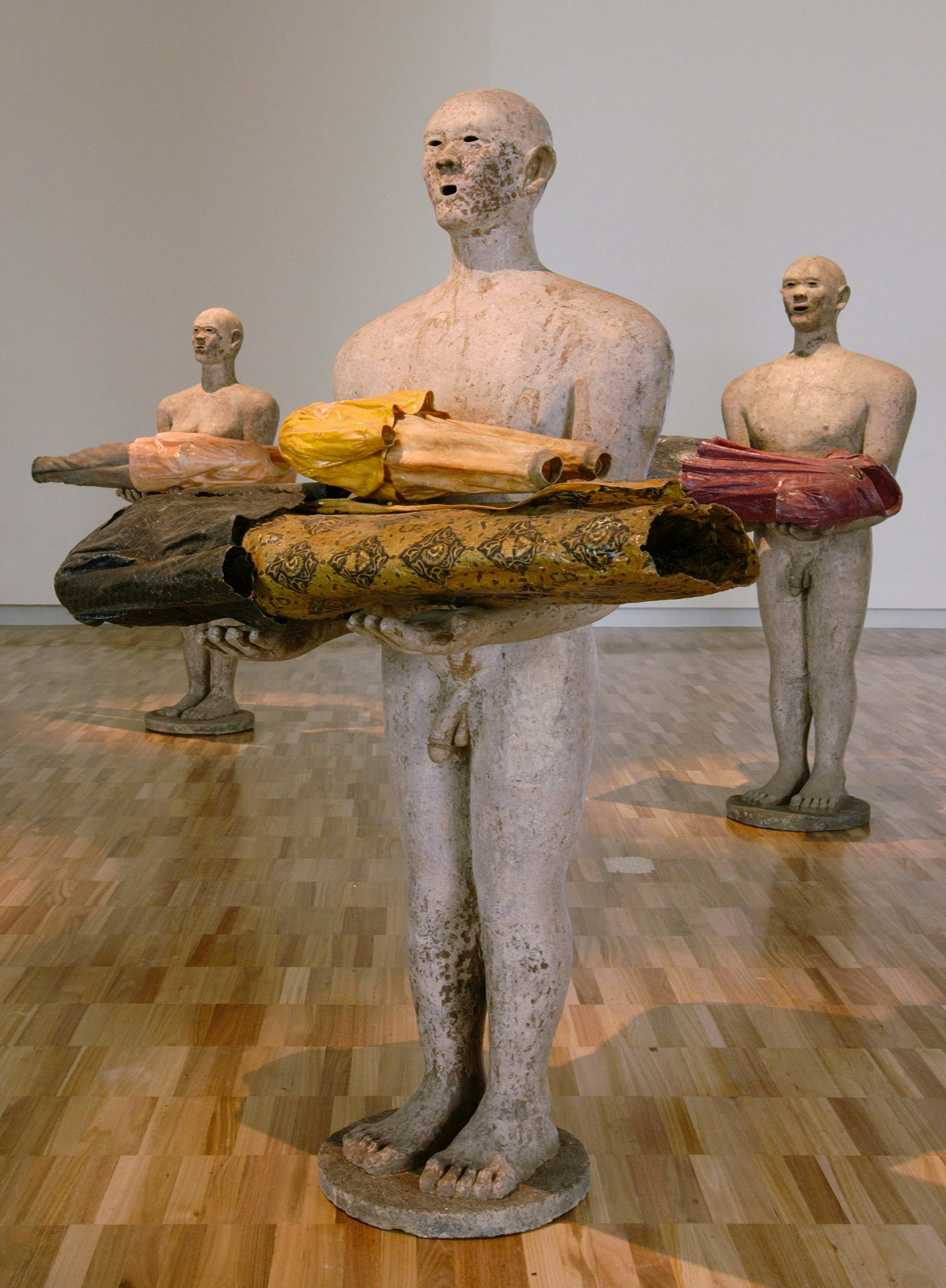 Three human sculptures as part of Dadang Christanto: They Give Evidence