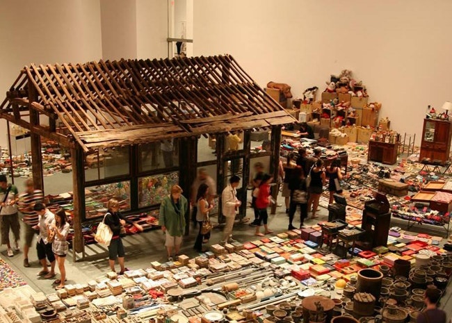 A photo showing a crowd of people at the Waste Not exhibition