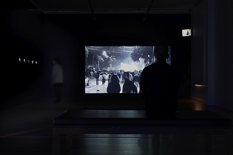James Newitt, Spectacle (2013-14), HD video with stereo sound, installation view, 4A Centre for Contemporary Asian Art. Courtesy the artist. Photo: Zan Wimberley