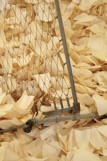 Araya Rasdjarmrearnsook, Has Girl Lost her Memory (first created 1994, 2014 iteration), corn husks and bed frame; installation detail, 4A Centre for Contemporary Asian Art. Courtesy Araya Rasdjarmrearnsook. Photo: Zan Wimberley