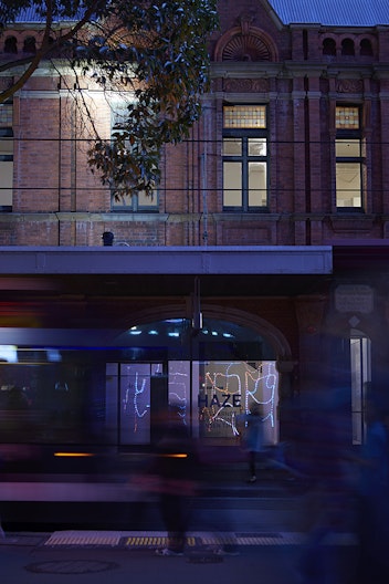 Tully Arnot, Cold Beer, Cold Women (2014), rope light, cable ties, string, Google translation of “Cold Beer” in simplified Chinese; exterior installation view, 4A Centre for Contemporary Asian Art. Courtesy the artist. Image: Zan Wimberley.