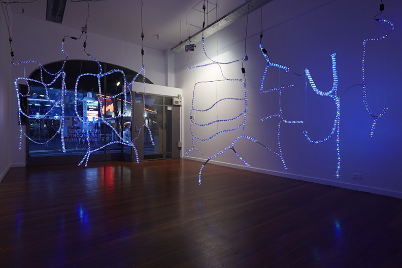 Tully Arnot, Cold Beer, Cold Women (2014), rope light, cable ties, string, Google translation of “Cold Beer” in simplified Chinese; installation view and installation detail, 4A Centre for Contemporary Asian Art. Courtesy the artist. Image: Zan Wimberley.