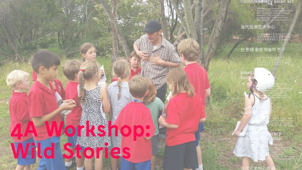 A photo of Diego Bonetto with a group of school children in a parkland, with pink text "4A Workshop: Wild Stories."