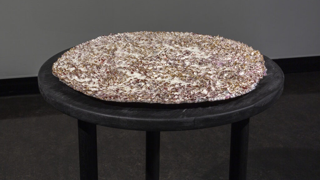 Wen-Hsi Harman, Theory of land, from Land Series, 2015, handbuilt royale porcelain, with enamel, gold luster, multiple firings, 60 x 53 x 3cm; courtesy the artist; mounted on: blackwood bench and assorted recycled hardwood legs, shou sugi-ban finish, wax, by Bryden Williams of Mount Framing