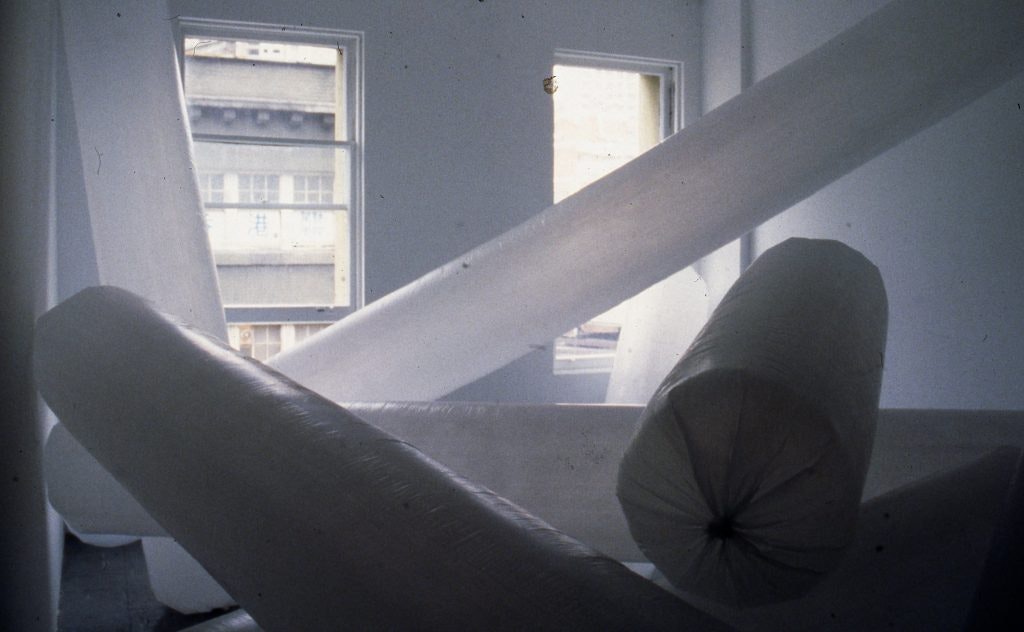 The entire gallery filled with industrial-sized white inflated plastic bags.