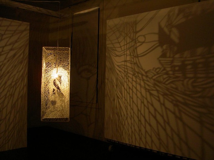 Phase 6: Sangeeta Sandrasegar, I’m Half Sick of Shadows, 2004, paper cut-out panels, glitter, glass beads, installation view. Courtesy the artist and Mori Gallery, Sydney.