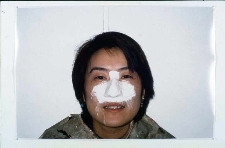 Cherine Fahd, Operation Nose Nose Operation (Noriko), 1999-2000, colour prints, 74 x 50 cm. Installation view, 4A Centre for Contemporary Asian Art.