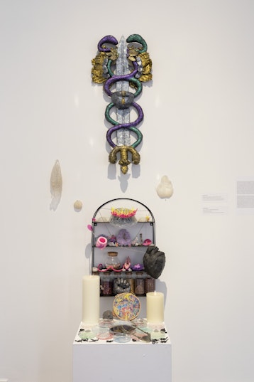 M. Sunflower, Wow Thanks, I’m Cured! Alter Altar, 2025, mixed media installation, dimensions variable; M. Sunflower, Djawarra Yarra (Weapon of Defense Sword), 2025 Acrylic, cardboard, clay, pigment, tin foil, wire and varnish, 90 x 38cm. Commissioned by 4A Centre for Contemporary Asian Art.