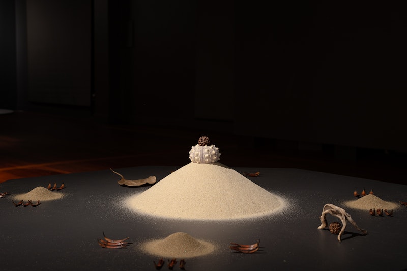 Man&Wah, Time & Tranquility, Sandscapes of Cosmic Geometry, 2025, sand, nature elements, MDF, acrylic paint, LED lights. Image: Kai Wasikowski