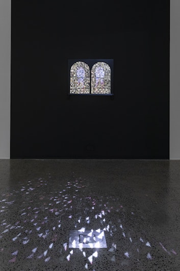 Ali Tahayori, Kill Me Softly, 2024, hand-cut mirrors and plaster on vintage window frame, single-channel HD video, 2 min 53 sec. Courtesy the artist and this is no fantasy, Naarm/Melbourne.