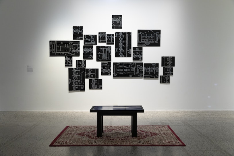 Khaled Sabsabi, South @ Part B, 2017–19, 22 acrylic, enamel paint and oil stick on canvas, MDF board and paper; Khaled Sabsabi, Tawla, 2011, single channel HD video installation, 12m, TV, audio, adapted coffee table, wood and acrylic paint. All works collection of the artist.