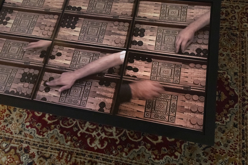 Khaled Sabsabi, Tawla, 2011, single channel HD video installation, 12m, TV, audio, adapted coffee table, wood and acrylic paint. Collection of the artist.