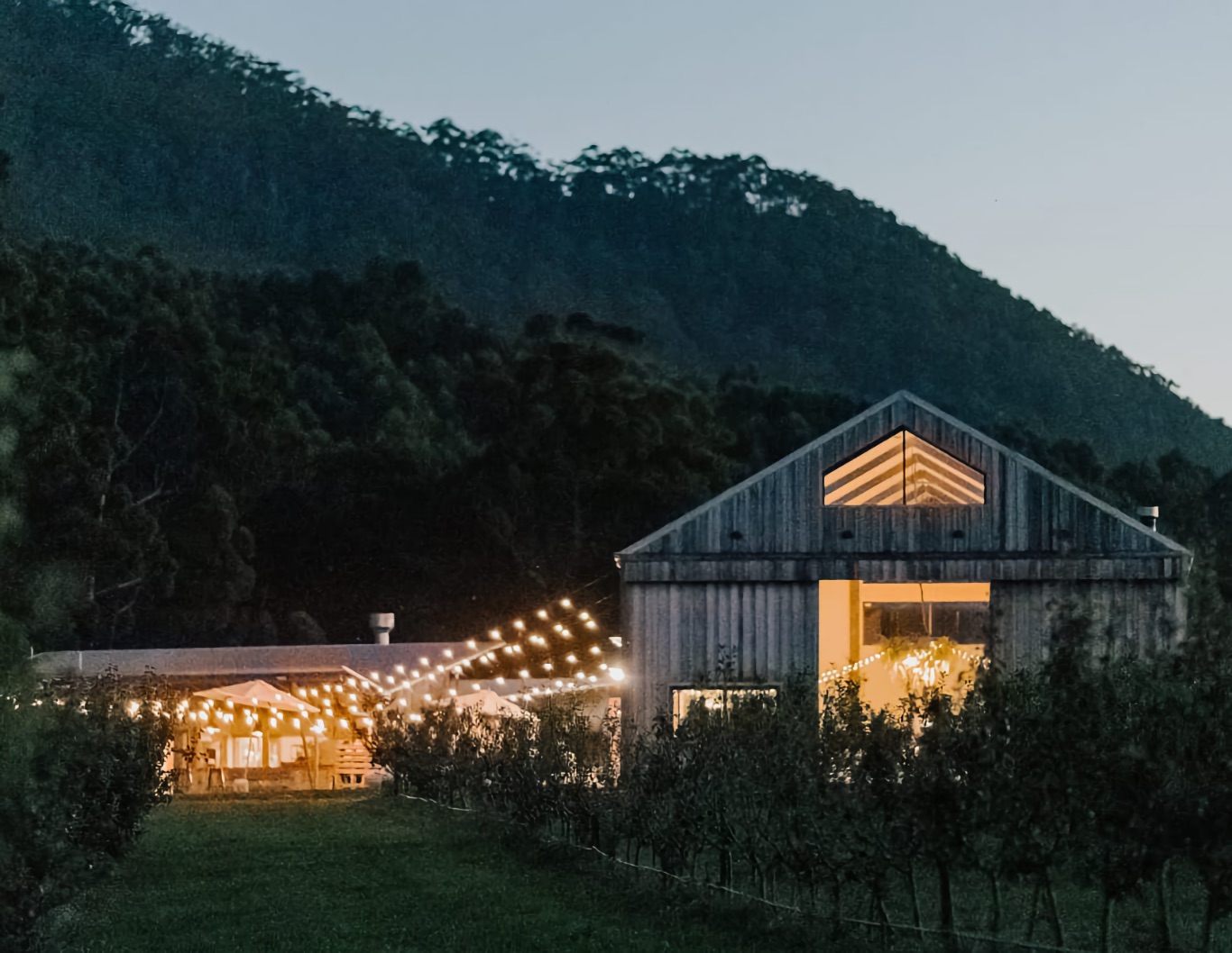 Exterior of Mount Gnomon Farm at dusk.