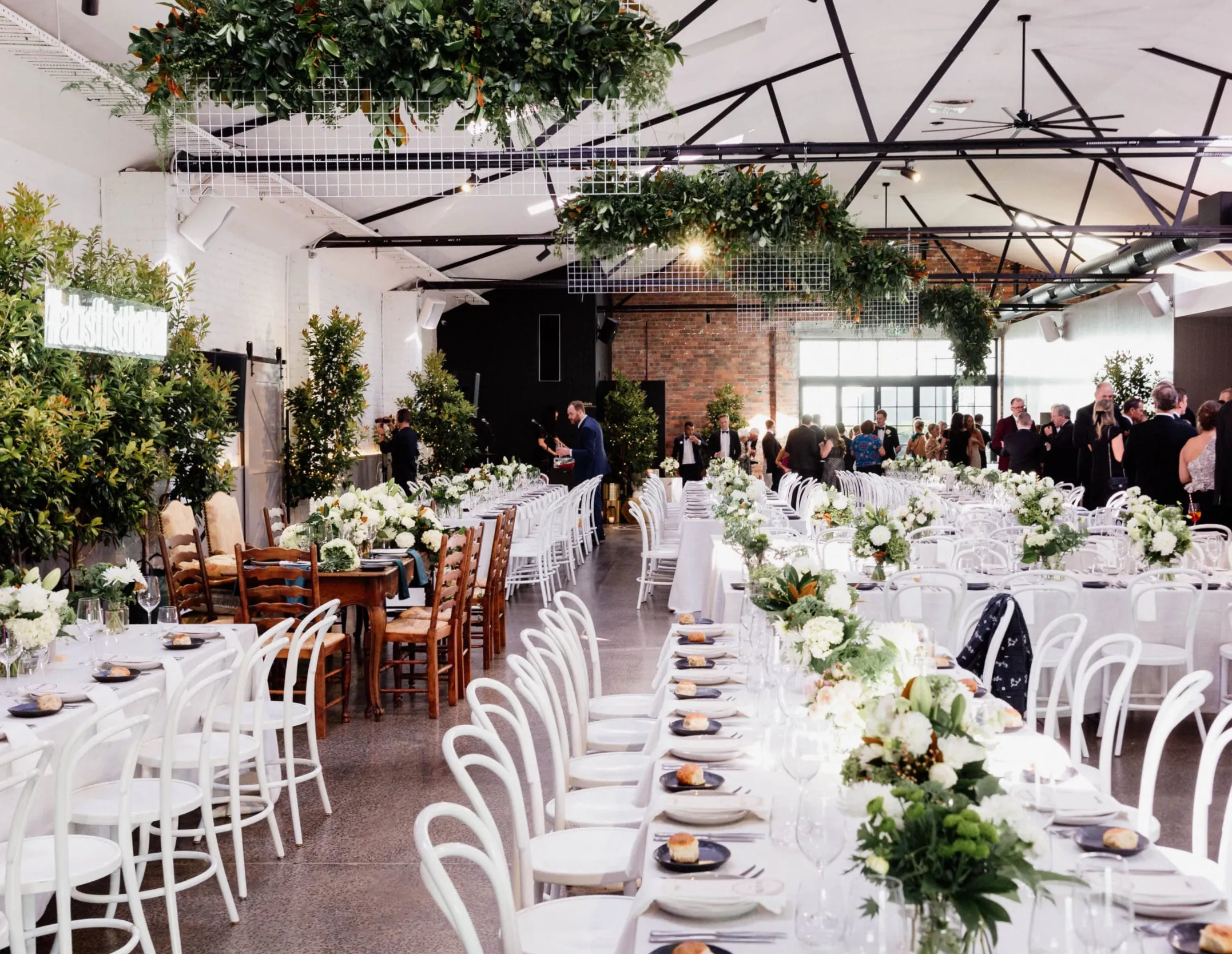 Tables arranged for a wedding reception at Canvas House.