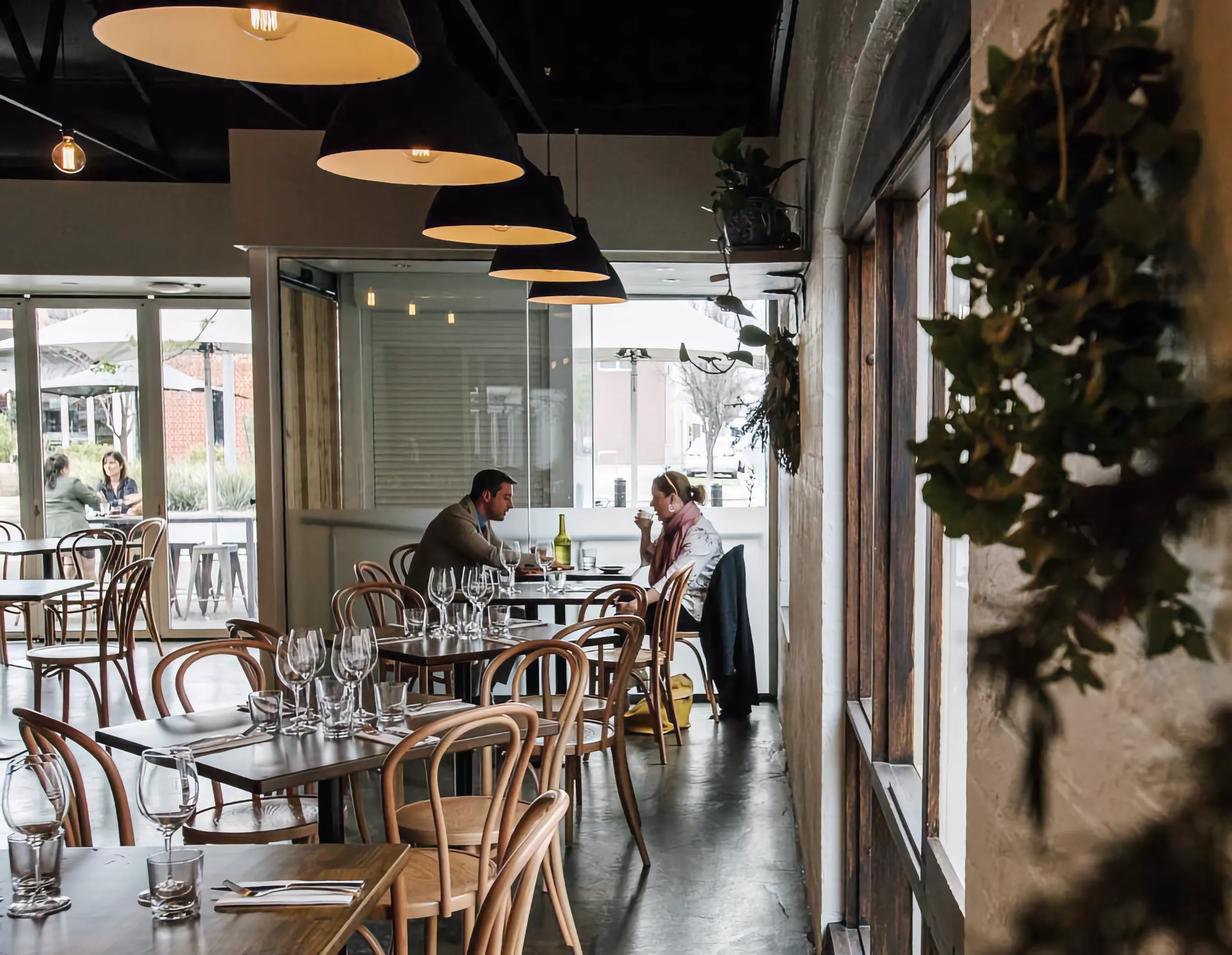 Couple eat at Herringbone.