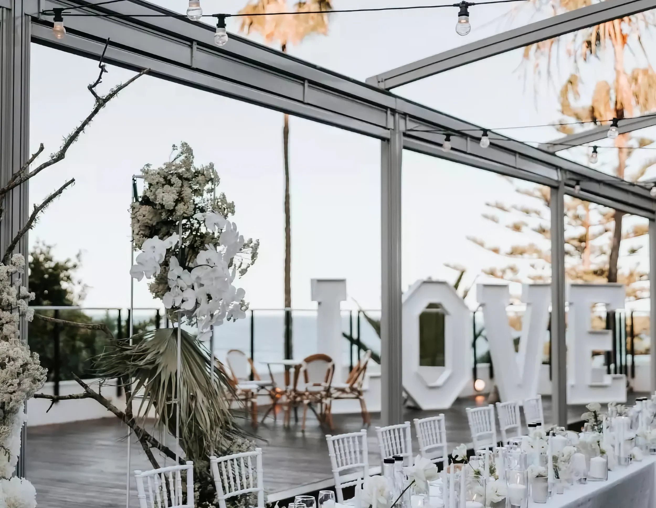 Outdoor wedding ceremony with ocean views.