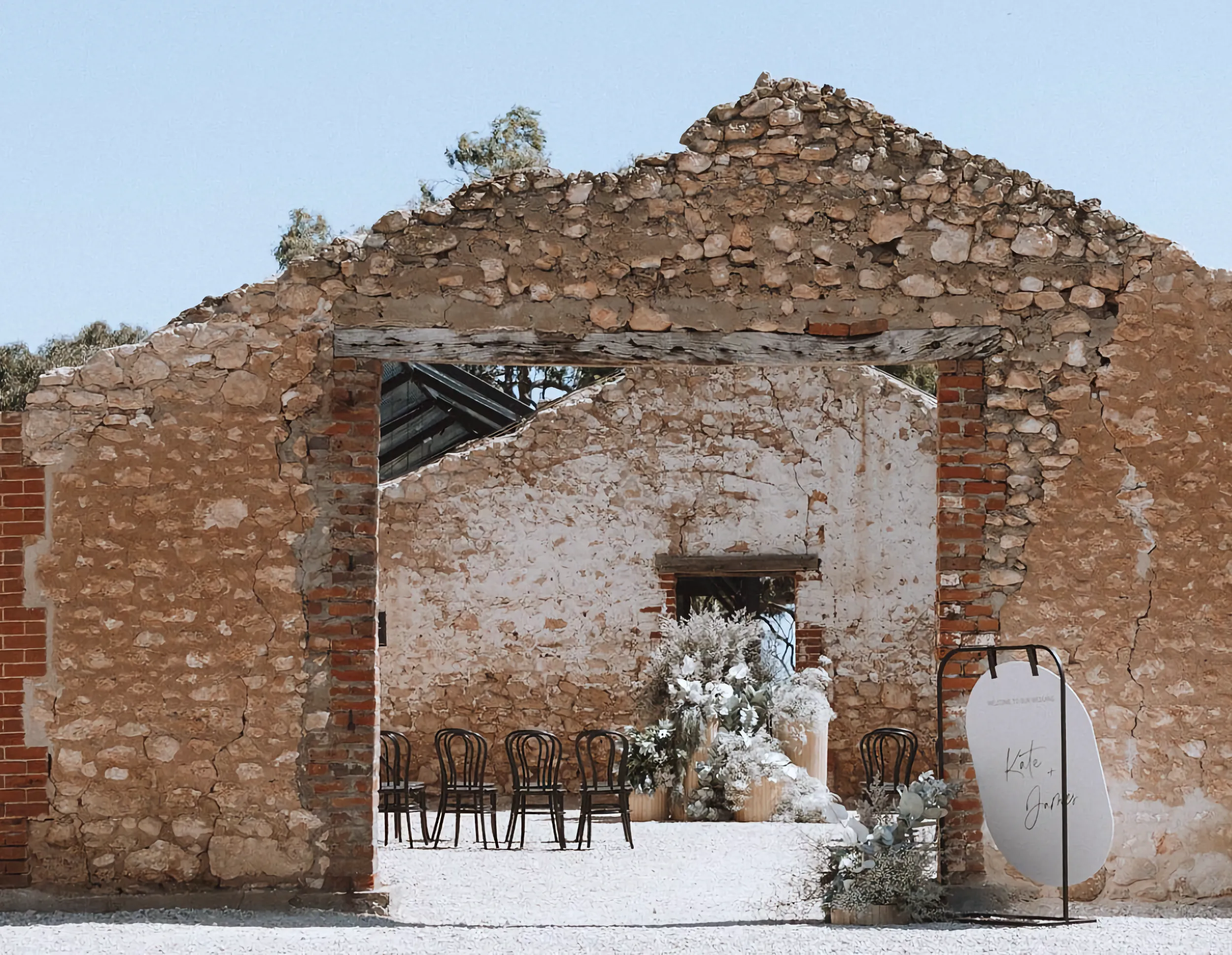 Wedding ceremony setup at Woodburn Homestead