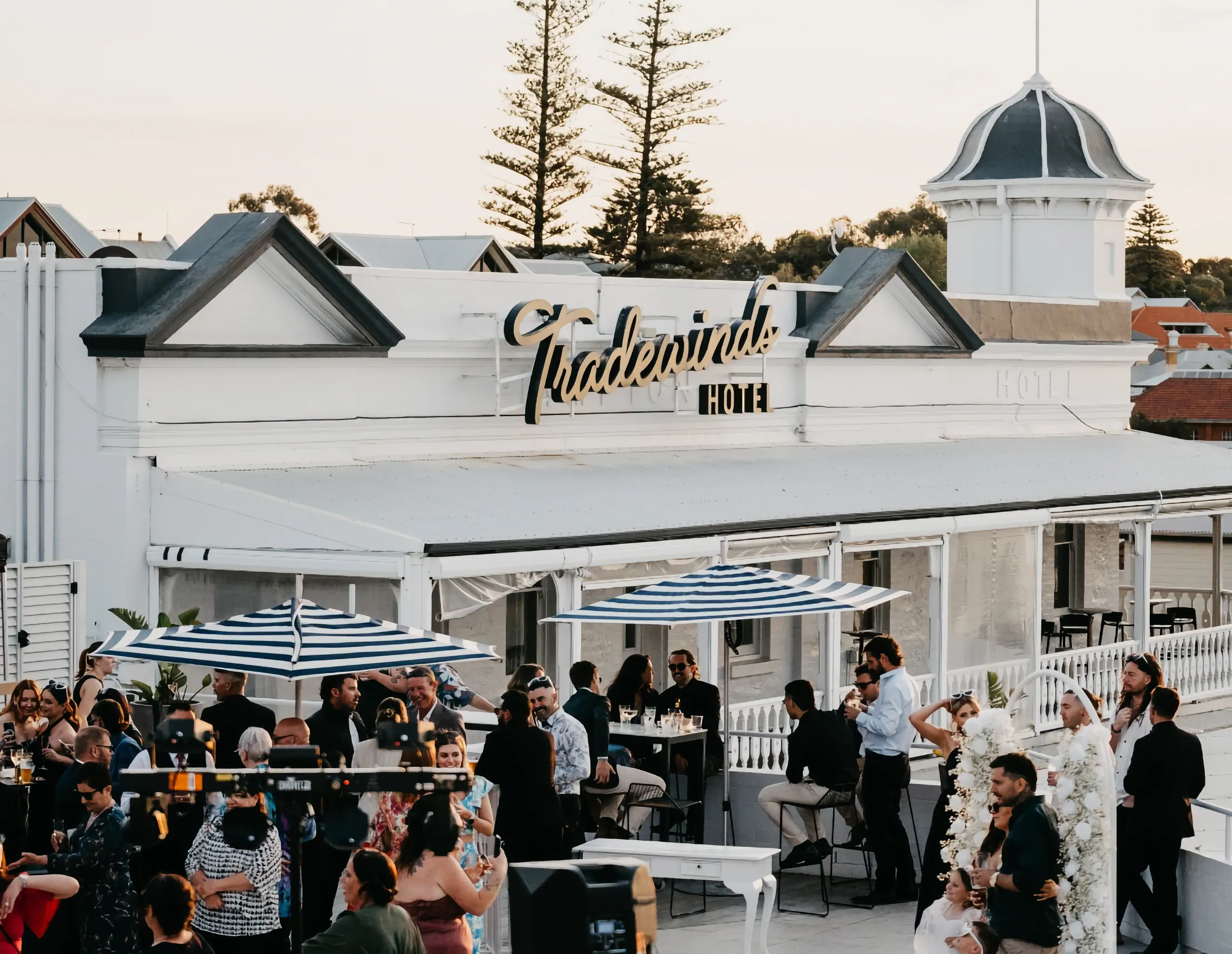 Outdoor gathering at the Tradewinds Hotel