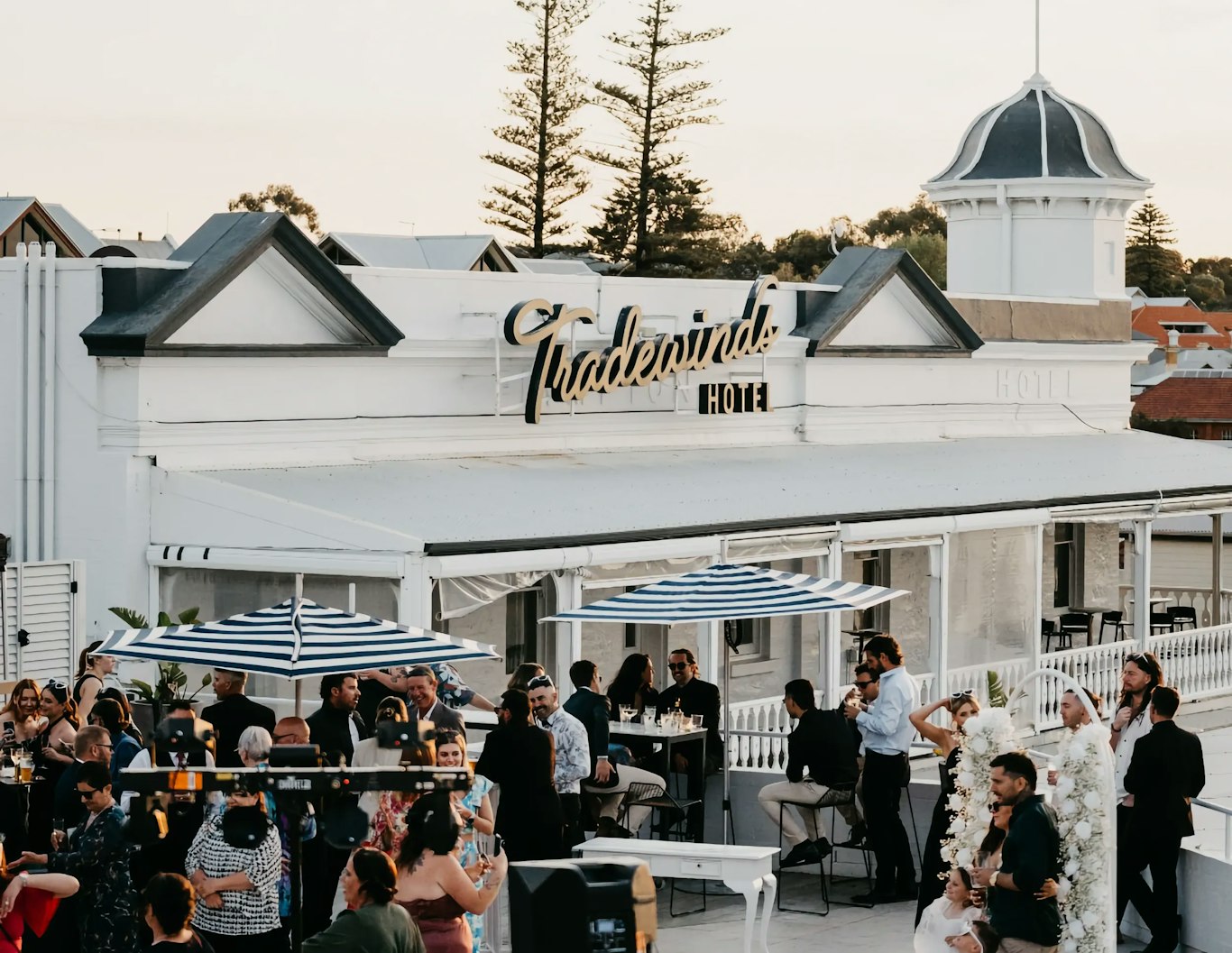 Outdoor gathering at the Tradewinds Hotel