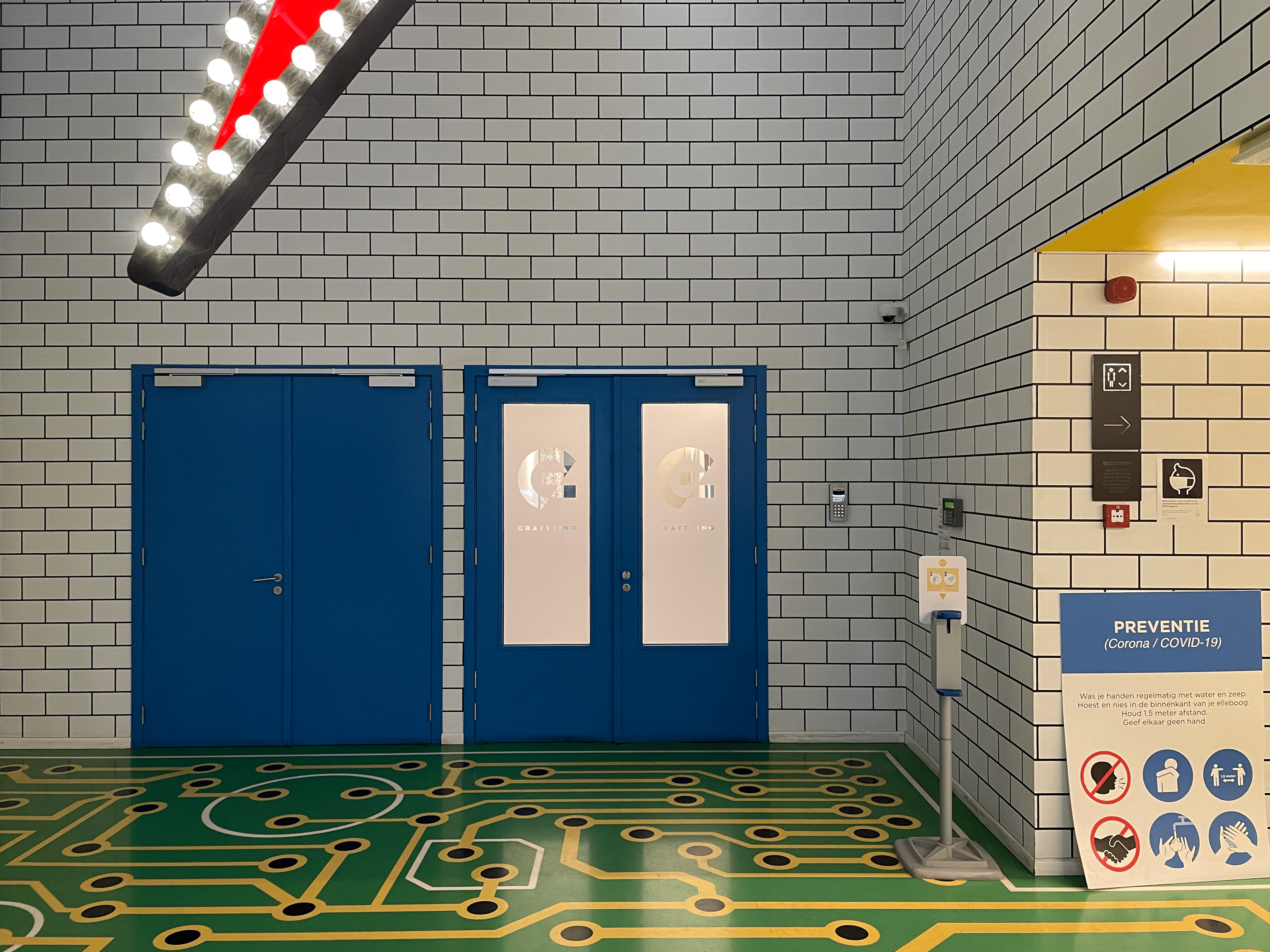 A photo showing the blue Craftzing doors in the Watt building entrance hall
