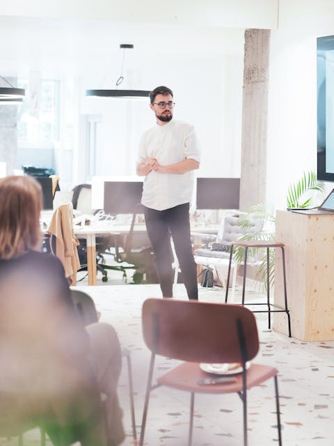 Food for thought presentation Photo of a man presenting at food for thought