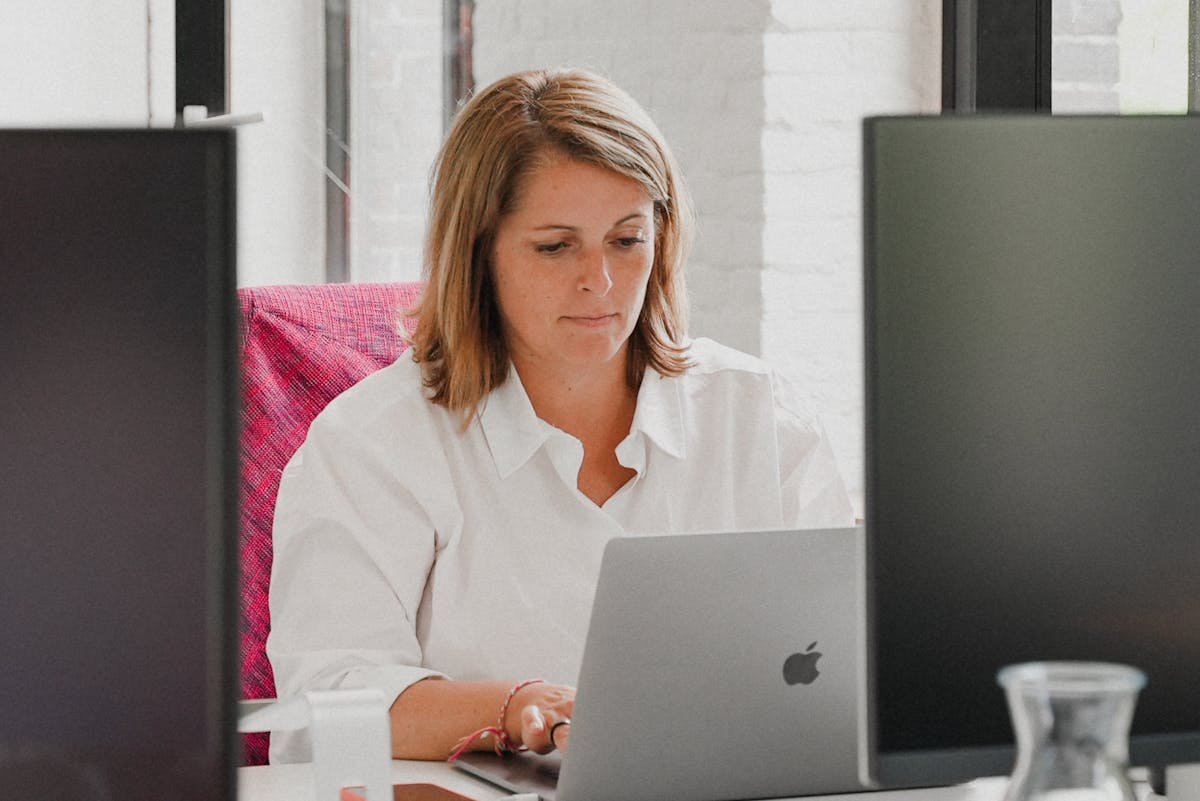 Image of a woman working on a computer