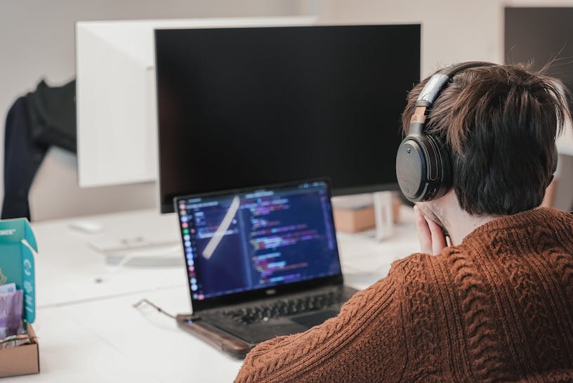 Developer working on his computer