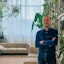 Digital strategist and concept architect Wim Walraevens next to a wall with plants