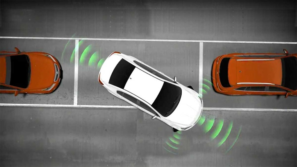 Using sonar sensors and sound to sense objects behind the vehicle
