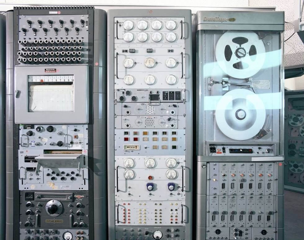NASA Instrumentation racks at Huntsville, Alabama. Telemetry receiver (center), instrumentation tape recorder (right), and a Honeywell strip chart recorder (left). Image courtesy of Popular Mechanics